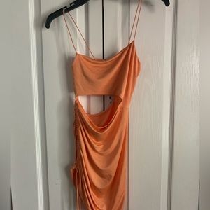 Mini dress, opening stomach, stretchy.